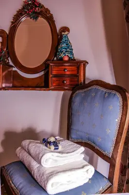 Letto o letti in una camera di WELL COME - Museo