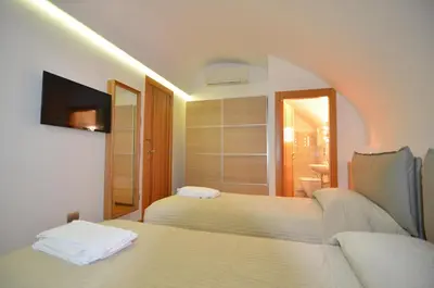 Letto o letti in una camera di La Strada Parlata