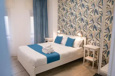 Letto o letti in una camera di Studio19