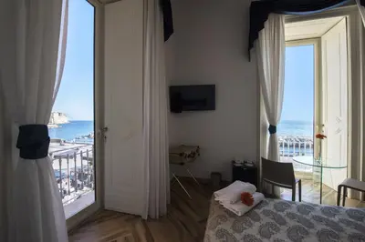 Letto o letti in una camera di Mareluna Suite de Charme