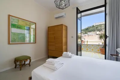 Letto o letti in una camera di My Loft in Naples