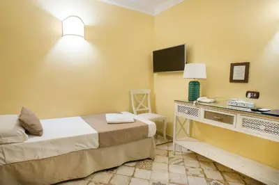 Letto o letti in una camera di Dependance
