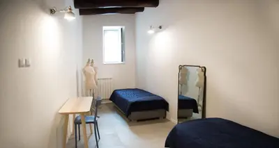Letto o letti in una camera di Decumano 23