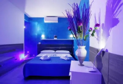 Letto o letti in una camera di Chiaia Relax