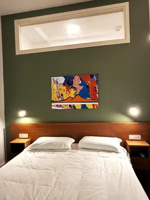 Letto o letti in una camera di Casa Amato