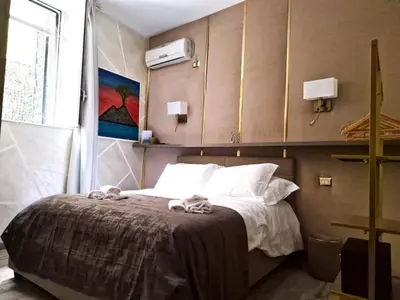 Letto o letti in una camera di La Dimora nei presepi in San Gregorio
