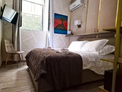 Letto o letti in una camera di La Dimora nei presepi in San Gregorio