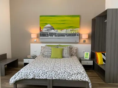 Letto o letti in una camera di B&B Casa Caracciolo