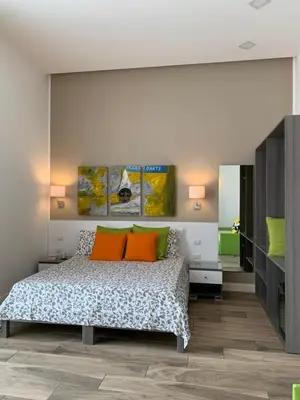 Letto o letti in una camera di B&B Casa Caracciolo