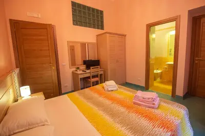 Letto o letti in una camera di B&B al Centro Storico