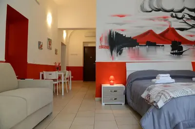 Letto o letti in una camera di B&B La Torretta Chiaia