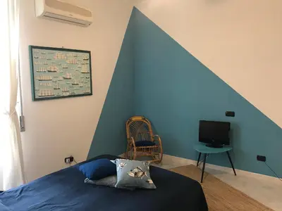 TV o dispositivi per l'intrattenimento presso Apartment in the historical center with panoramic terrace