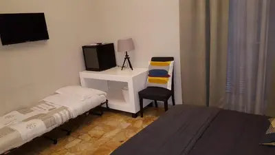 Letto o letti in una camera di B&B Rettifilo