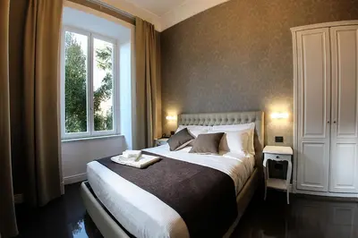 Letto o letti in una camera di Villa San Martino
