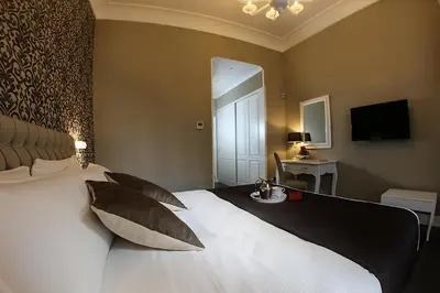 Letto o letti in una camera di Villa San Martino
