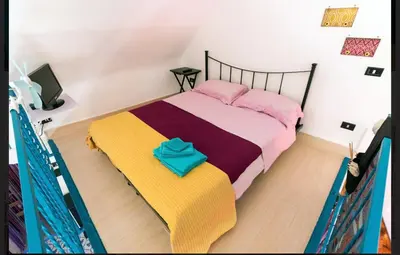 Letto o letti in una camera di Appartamento Valentina e Viviana