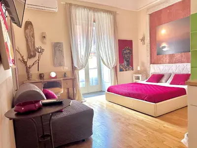 Letto o letti in una camera di Corso 211 Beds & Suites