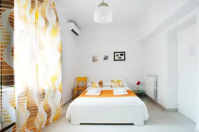 Letto o letti in una camera di Interno16HolidayHome