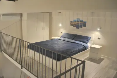 Letto o letti in una camera di Smart Central Apartments San Gregorio