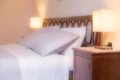 Letto o letti in una camera di Magione Serra , dimora partenopea