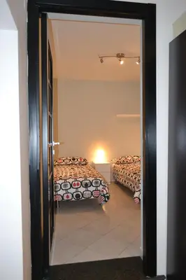 Letto o letti in una camera di HomeNapoli