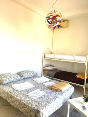 Letto o letti in una camera di Miseria e Nobiltà Apartment CHECK-IN FROM 12 00 TO 15 00