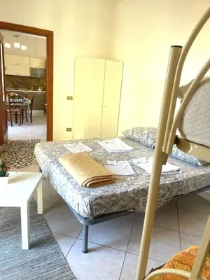 Letto o letti in una camera di Miseria e Nobiltà Apartment CHECK-IN FROM 12 00 TO 15 00