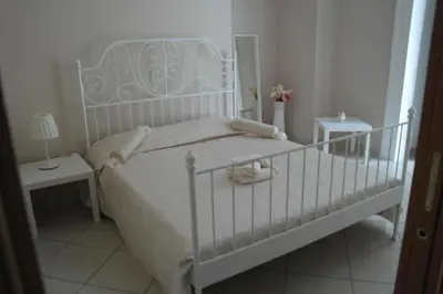 Letto o letti in una camera di A due passi da Dante
