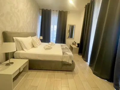 Letto o letti in una camera di Bovio Square XIV