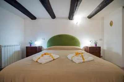 Letto o letti in una camera di La Regina di Vertecoeli