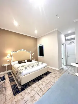Letto o letti in una camera di Certosa Suite
