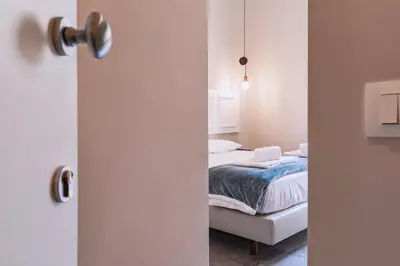 Letto o letti in una camera di La Smorfia