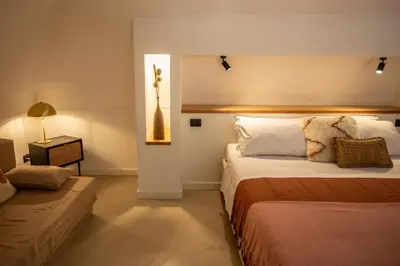 Letto o letti in una camera di ES Suites