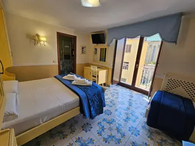 Letto o letti in una camera di Le Ninfe Luxury Rooms