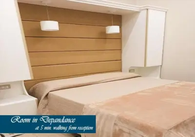 Letto o letti in una camera di Le Ninfe Luxury Rooms