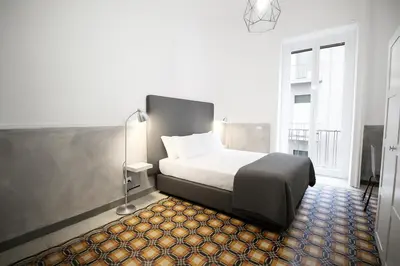 Letto o letti in una camera di Toledostop