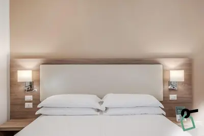 Letto o letti in una camera di Residenza Scarlatti Napoli