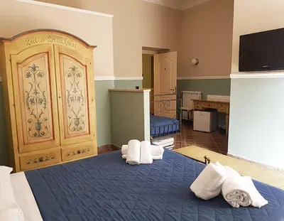 Letto o letti in una camera di B&B Delle Palme