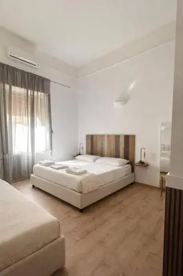 Letto o letti in una camera di B&B Università
