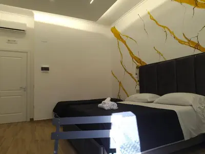 Letto o letti in una camera di Maison Arena