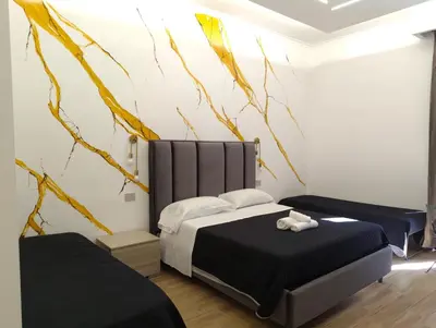 Letto o letti in una camera di Maison Arena