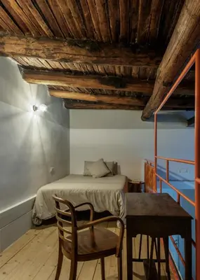 Letto o letti in una camera di SuperOtium