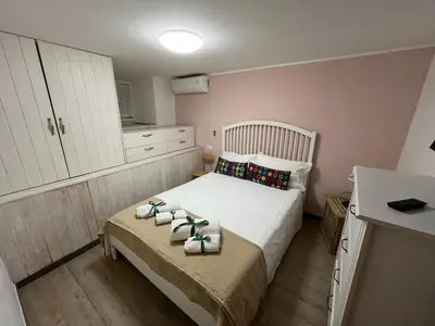 Letto o letti in una camera di Appartamento Beverello