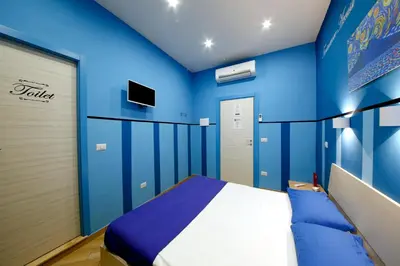 Letto o letti in una camera di B&B Residenza Alba