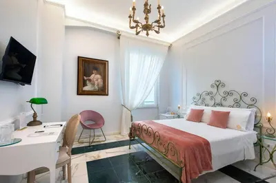 Letto o letti in una camera di Residenza Borbonica