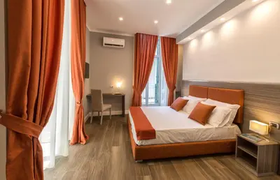Letto o letti in una camera di Dante Maison de Charme