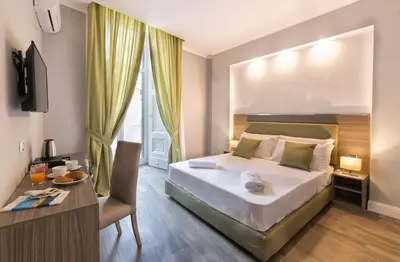 Letto o letti in una camera di Dante Maison de Charme