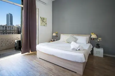 Letto o letti in una camera di Hotel Le Orchidee