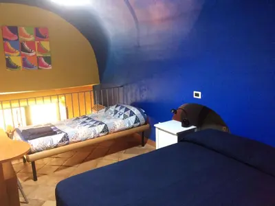 Letto o letti in una camera di Casa Colore