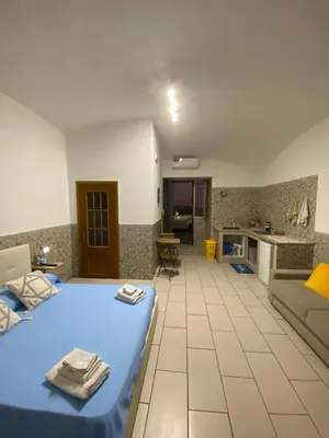 Letto o letti in una camera di Maradona Home